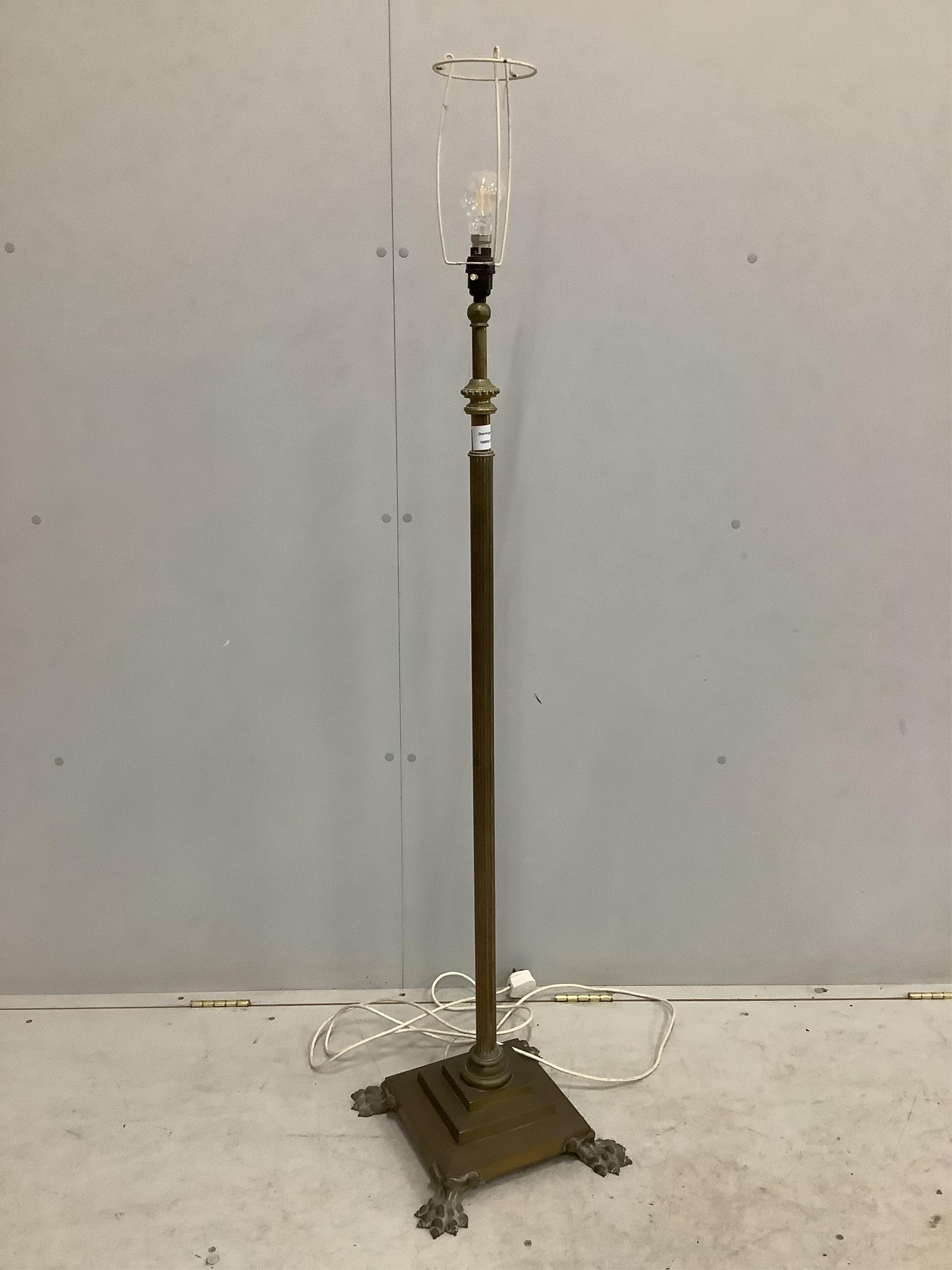 An Edwardian Corinthian column brass telescopic standard lamp. Condition - fair